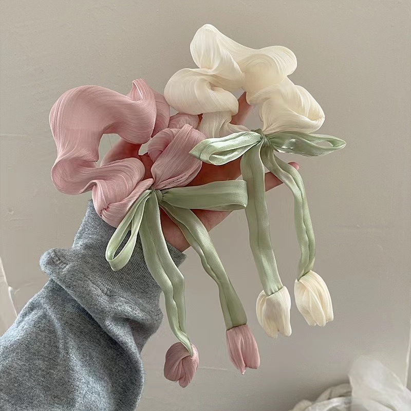 Are there any discounts for buying Tulip flower bow hair scrunchies in bulk?